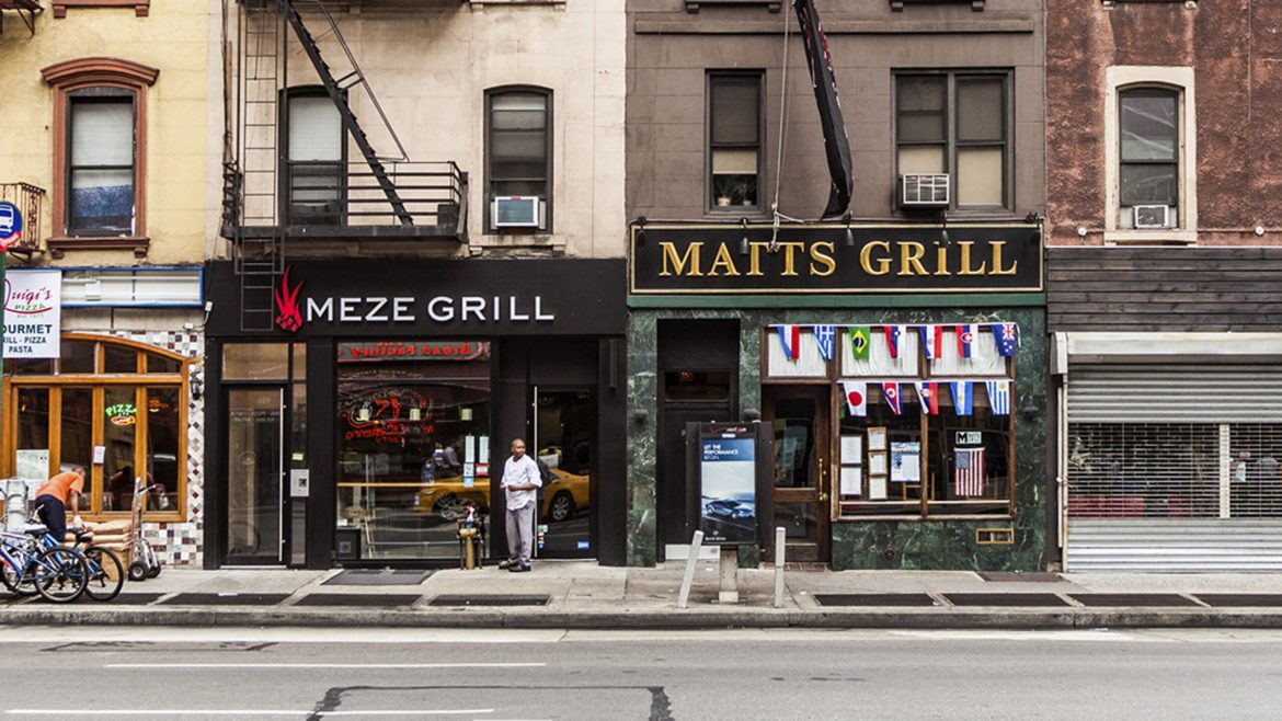 typical brick building with 5 story houses